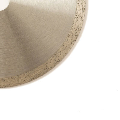 กดเย็น 7 นิ้ว 180 × 1.6 / 2.2 × 10 × 22.23 มม. ใบมีดขอบเพชรแบบต่อเนื่องสำหรับเซรามิกหินอ่อนที่มีอายุการใช้งานยาวนาน